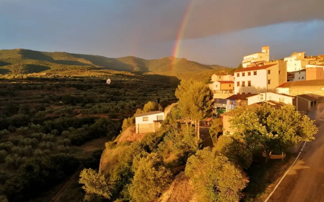 arcoiris tras el paisaje
